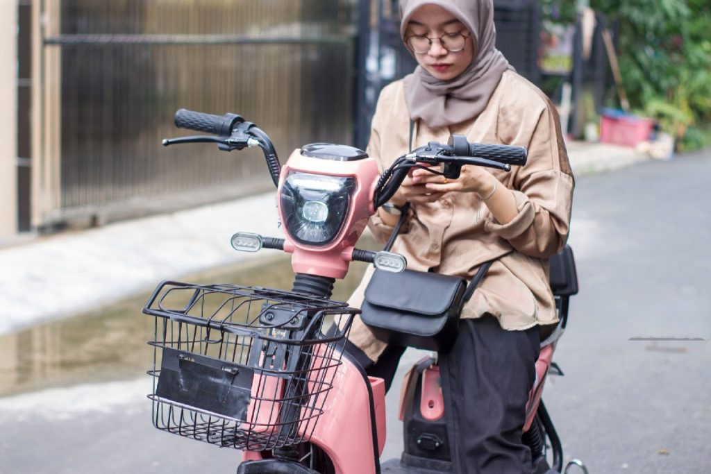 girl riding electric bike