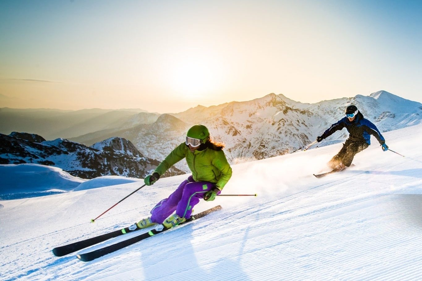 two people skiing on mountain