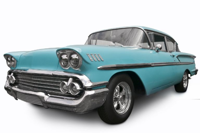 1958 classic American Chevrolet Bel Air side view showing tires and front 
